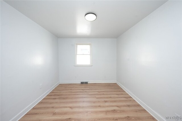 8 Wagner Ave, Cheektowaga, NY 14206 - empty room featuring baseboards and light wood-style flooring