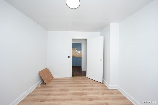 8 Wagner Ave, Cheektowaga, NY 14206 - unfurnished room with light wood finished floors and baseboards