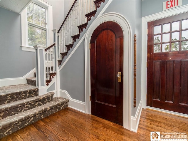 474 Fairmount Ave, Ellicott, NY 14701 - foyer with wood finished floors, stairs, and baseboards