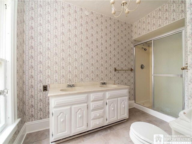 474 Fairmount Ave, Ellicott, NY 14701 - bathroom featuring a stall shower, tile patterned floors, wallpapered walls, a chandelier, and double vanity