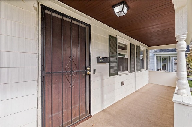 entrance to property with a porch