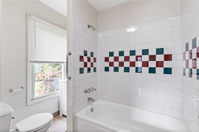 full bathroom featuring toilet and shower / tub combination