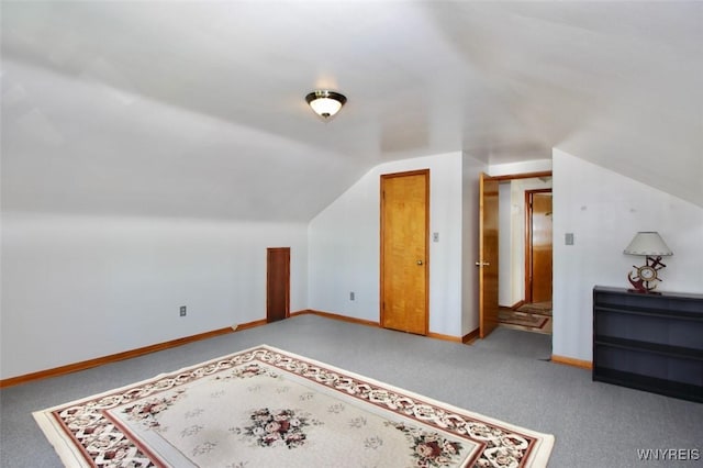 150 Leonard St, Lackawanna, NY 14218 - additional living space featuring vaulted ceiling, carpet floors, and baseboards
