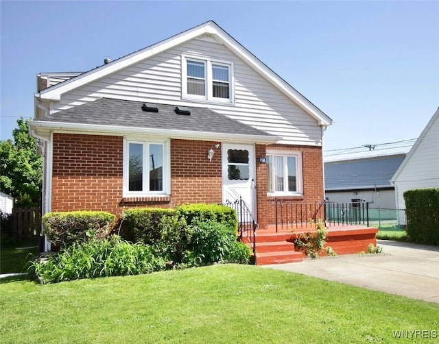 150 Leonard St, Lackawanna, NY 14218 - view of front of property with brick siding and a shingled roof