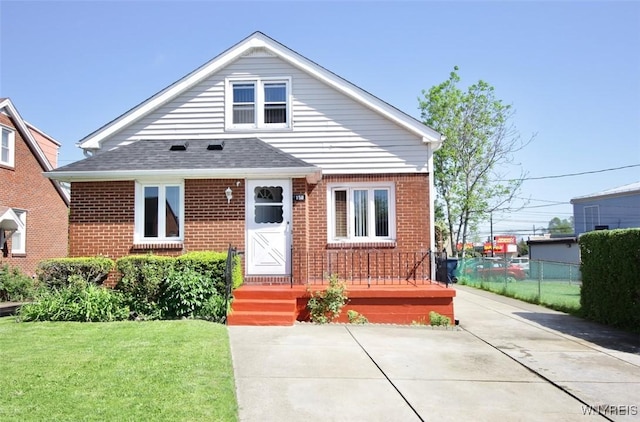 150 Leonard St, Lackawanna, NY 14218 - view of front facade featuring brick siding and roof with shingles