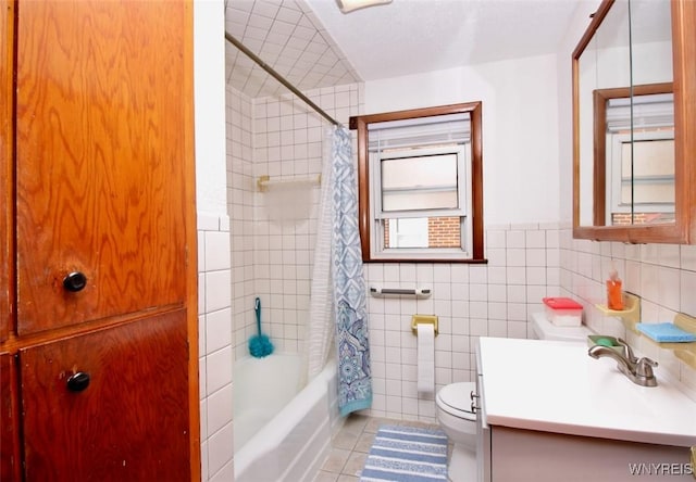 150 Leonard St, Lackawanna, NY 14218 - full bathroom with toilet, tile patterned flooring, vanity, shower / bathtub combination with curtain, and tile walls