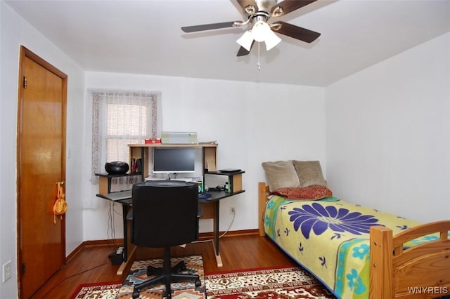 150 Leonard St, Lackawanna, NY 14218 - bedroom with wood finished floors, an office area, and baseboards