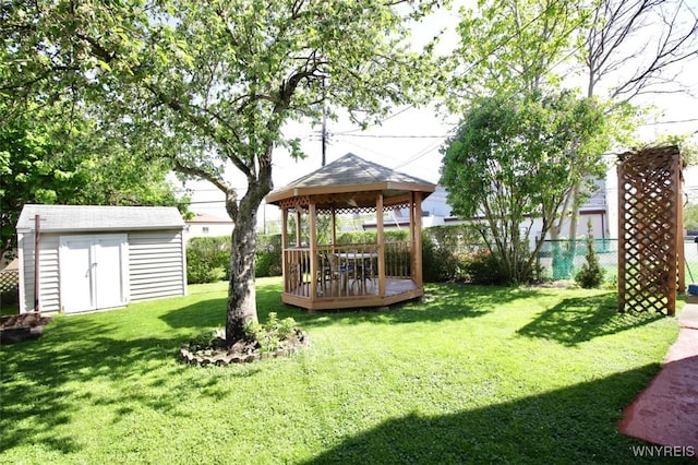 150 Leonard St, Lackawanna, NY 14218 - view of yard with a gazebo, a storage unit, an outdoor structure, and a deck