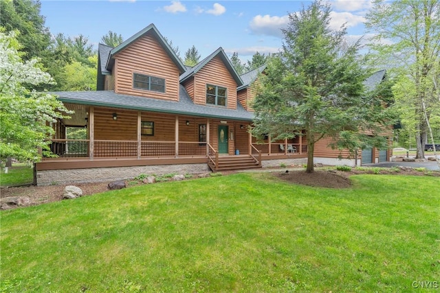 chalet / cabin featuring a front lawn, a porch, and faux log siding