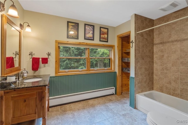 full bathroom featuring a baseboard heating unit, vanity, shower / tub combination, toilet, and tile patterned flooring