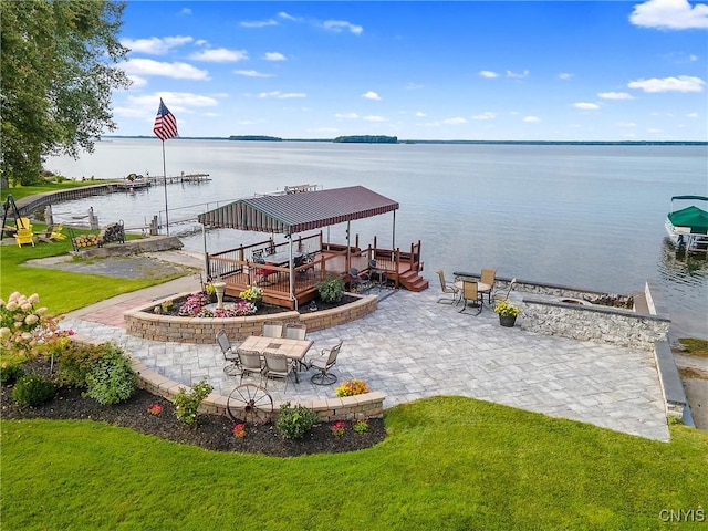 7179 Lakeshore Rd, Cicero, NY 13039 - dock area featuring boat lift, a patio, a water view, and a yard