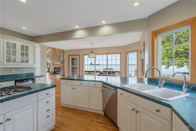 7179 Lakeshore Rd, Cicero, NY 13039 - kitchen featuring stainless steel appliances, plenty of natural light, white cabinetry, and recessed lighting