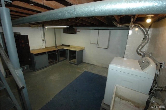 3761 S Main Street Rd, Batavia-Town, NY 14020 - unfinished basement featuring washer / dryer and concrete block wall