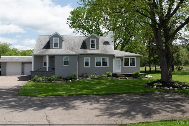 744 State Route 13, Cortlandville, NY 13045 - cape cod house with stucco siding, a chimney, a front lawn, and a detached garage