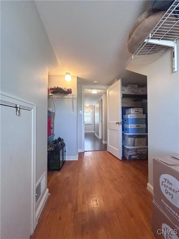 744 State Route 13, Cortlandville, NY 13045 - corridor with hardwood / wood-style flooring and baseboards