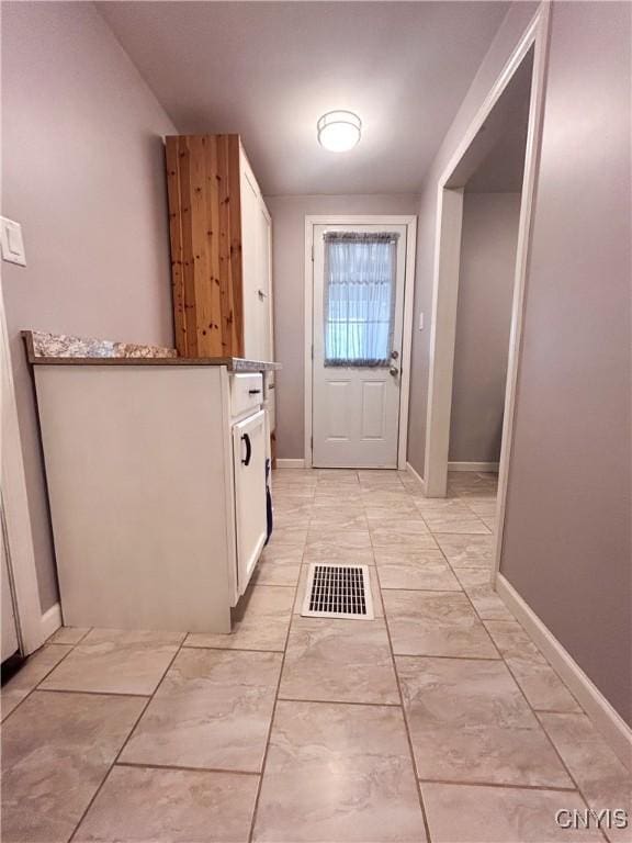 744 State Route 13, Cortlandville, NY 13045 - entryway featuring baseboards and light marble finish flooring