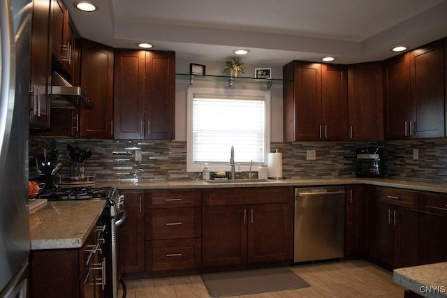 744 State Route 13, Cortlandville, NY 13045 - kitchen with appliances with stainless steel finishes, a sink, recessed lighting, backsplash, and range hood