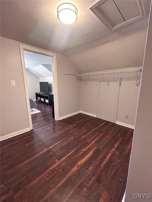 744 State Route 13, Cortlandville, NY 13045 - walk in closet featuring dark wood finished floors and lofted ceiling
