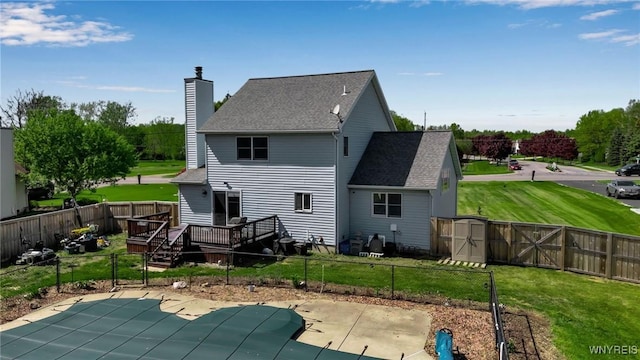 524 Pletcher Rd, Lewiston, NY 14092 - back of house featuring a wooden deck, a chimney, and a shingled roof