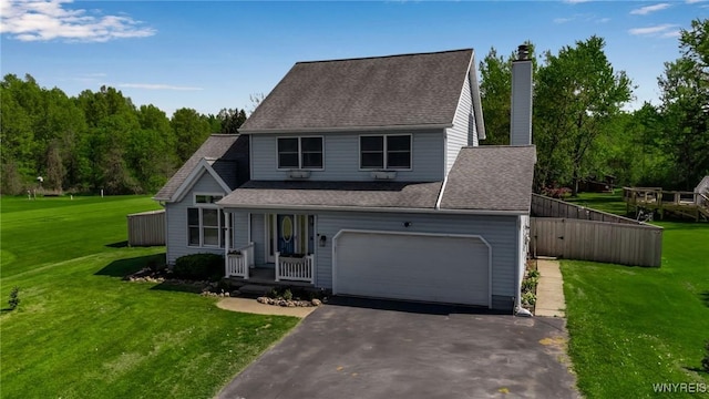524 Pletcher Rd, Lewiston, NY 14092 - view of front of property with driveway, a front yard, a chimney, and roof with shingles