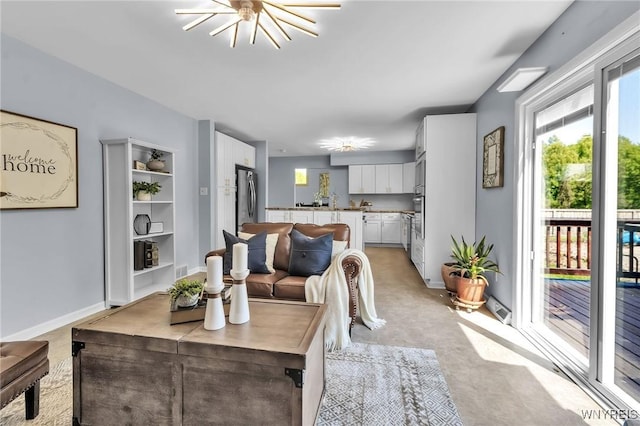 524 Pletcher Rd, Lewiston, NY 14092 - living room featuring baseboards