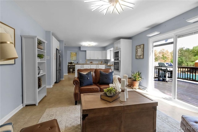 524 Pletcher Rd, Lewiston, NY 14092 - living room featuring baseboards