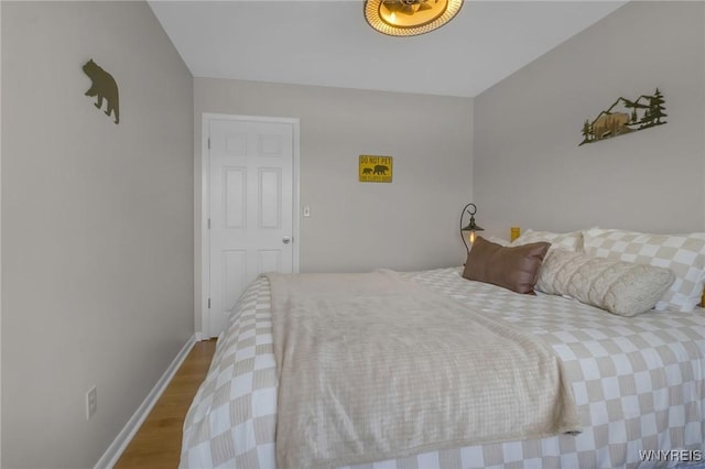524 Pletcher Rd, Lewiston, NY 14092 - bedroom featuring wood finished floors and baseboards
