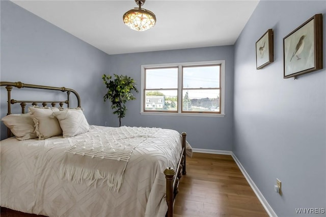 524 Pletcher Rd, Lewiston, NY 14092 - bedroom with wood finished floors and baseboards