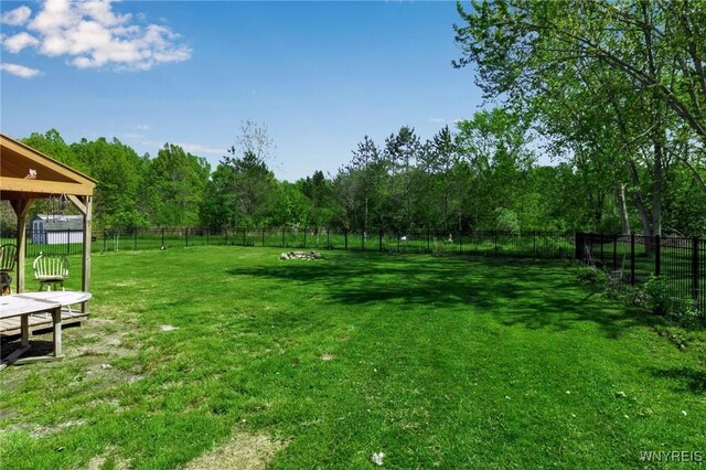 524 Pletcher Rd, Lewiston, NY 14092 - view of yard featuring a wooded view