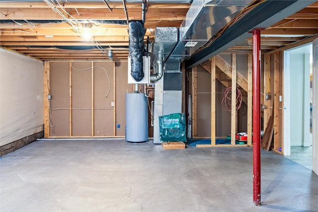 unfinished below grade area featuring gas water heater