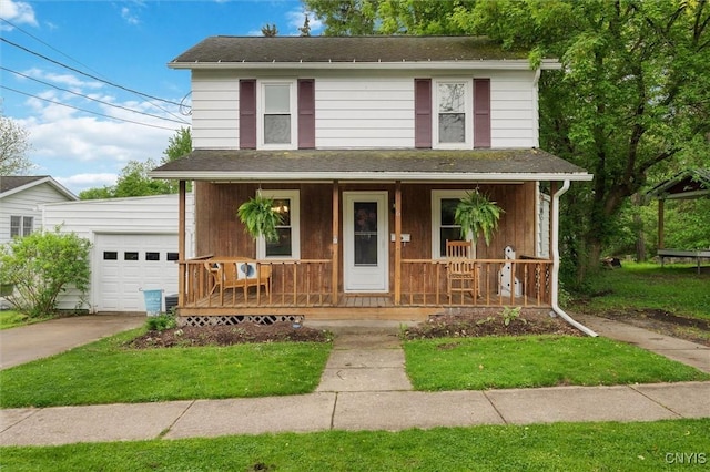 view of front of house with a porch, concrete driveway, and roof with shingles