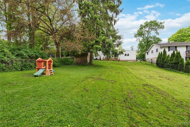 view of yard with a playground