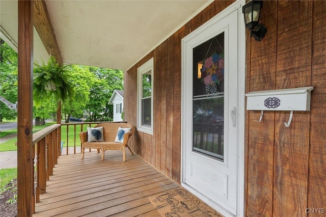 wooden deck featuring covered porch