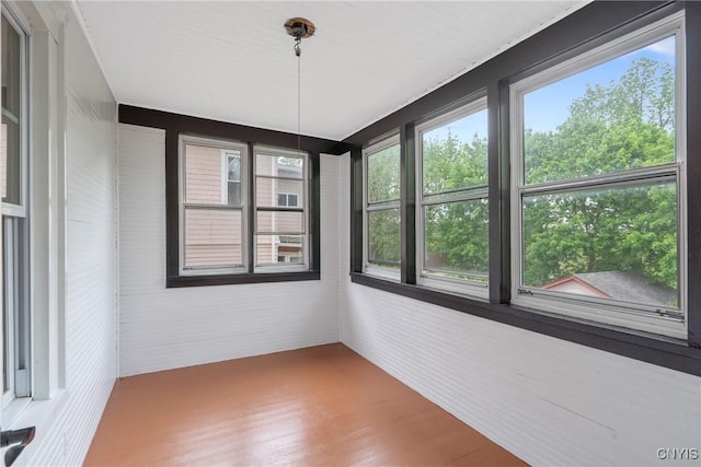 944 Bellevue Ave, Syracuse, NY 13204 - unfurnished sunroom with wood finished floors