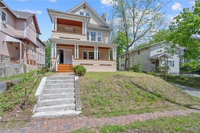 944 Bellevue Ave, Syracuse, NY 13204 - view of front of home featuring covered porch, a chimney, and fence