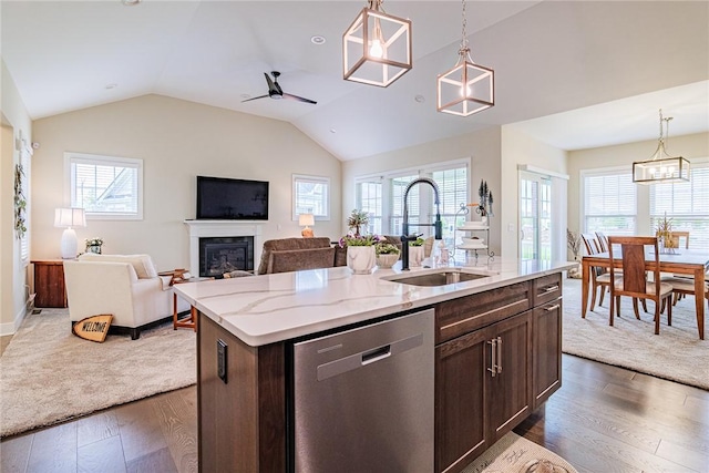 225 Cos Grande, Brighton, NY 14618 - kitchen featuring dishwasher, a sink, dark wood-type flooring, dark brown cabinetry, and vaulted ceiling