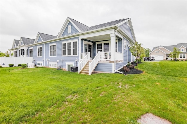 225 Cos Grande, Brighton, NY 14618 - view of front of house featuring a front yard and covered porch