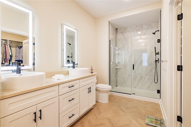 225 Cos Grande, Brighton, NY 14618 - full bathroom featuring a marble finish shower, double vanity, and toilet
