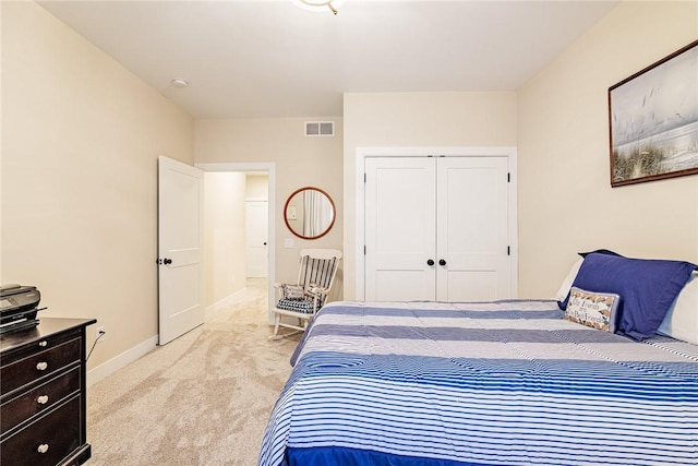 225 Cos Grande, Brighton, NY 14618 - bedroom featuring light colored carpet, a closet, and baseboards