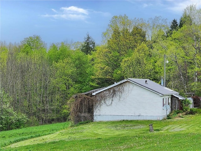 178 Dunshee Rd, Sidney, NY 13849 - view of property exterior featuring a lawn and a forest view