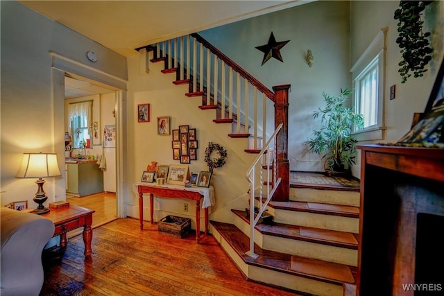 72 W 5th St, Dunkirk-City, NY 14048 - stairway with wood-type flooring