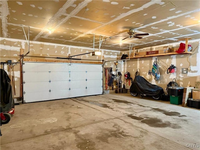 119 Sunrise Ct, Frankfort, NY 13340 - garage featuring a garage door opener and a ceiling fan