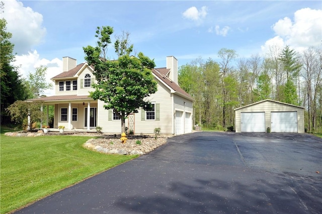 90 Davenport Rd, Big Flats, NY 14814 - view of front of property with a garage, a front lawn, a porch, a chimney, and an outbuilding