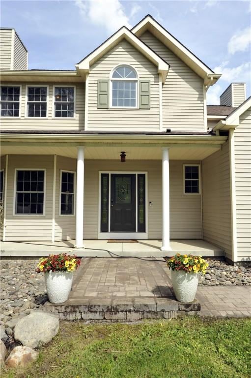 90 Davenport Rd, Big Flats, NY 14814 - back of house featuring covered porch