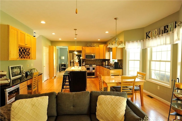 90 Davenport Rd, Big Flats, NY 14814 - dining space featuring wine cooler, light wood-style floors, baseboards, and recessed lighting