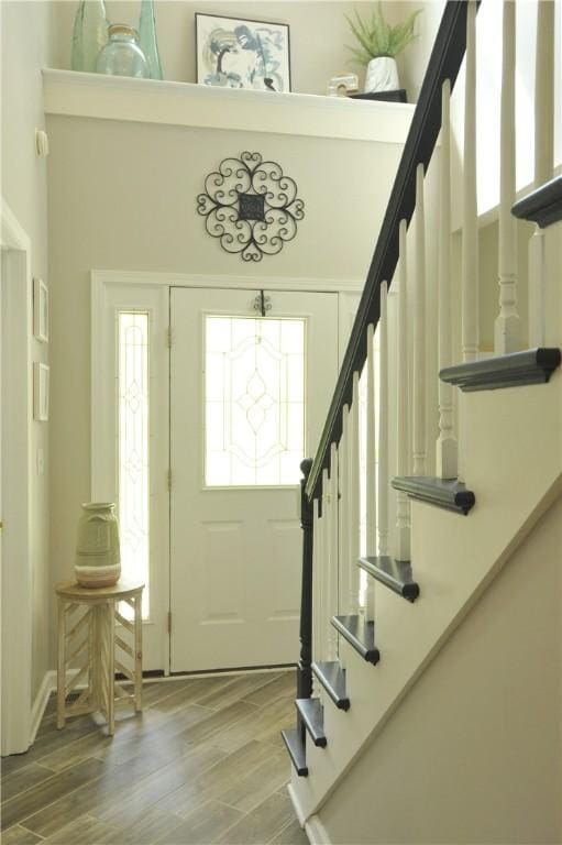 90 Davenport Rd, Big Flats, NY 14814 - foyer featuring stairs and light wood finished floors