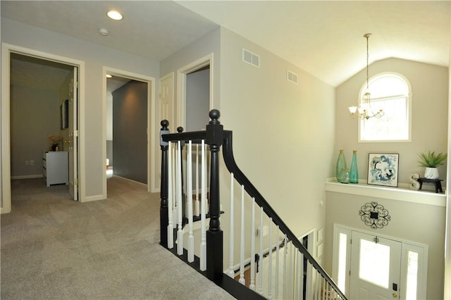 90 Davenport Rd, Big Flats, NY 14814 - hall featuring an upstairs landing, a chandelier, vaulted ceiling, carpet, and baseboards
