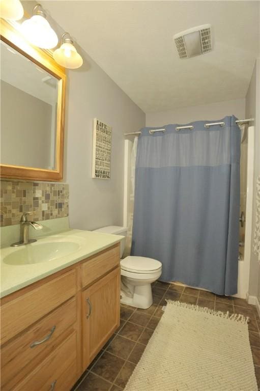 90 Davenport Rd, Big Flats, NY 14814 - full bathroom featuring tile patterned flooring, toilet, backsplash, and vanity