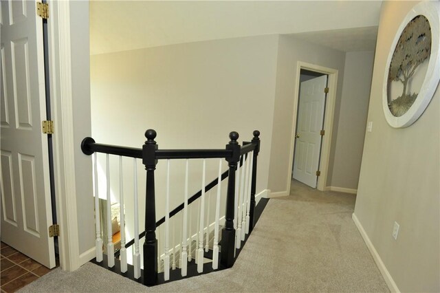 90 Davenport Rd, Big Flats, NY 14814 - hallway with an upstairs landing, baseboards, and carpet flooring