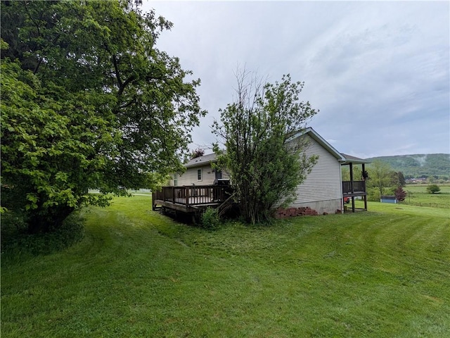 1405 W Main St, Smethport-Borough, PA 16749 - view of green lawn with a wooden deck